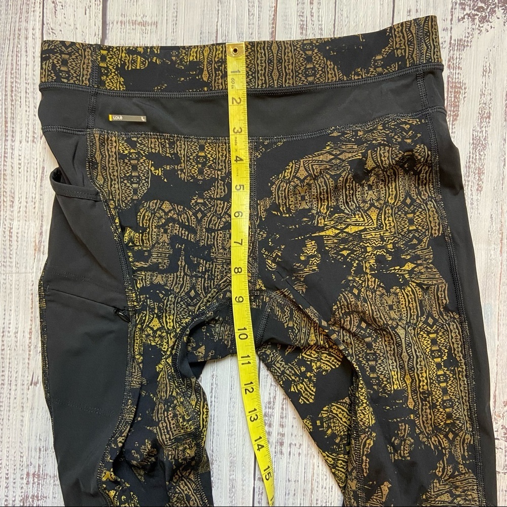 Lole Burst Black and Gold Print Ankle Leggings. Size Small. EUC - Picture 10 of 13